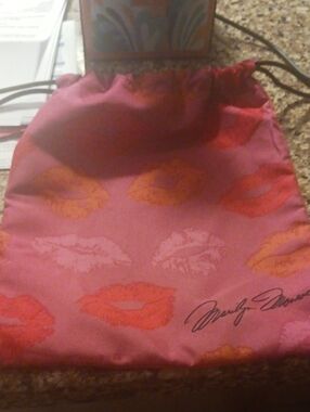 IPSY Marilyn Monroe Satin Lip-Print Drawstring Pouch in Pink and Red
